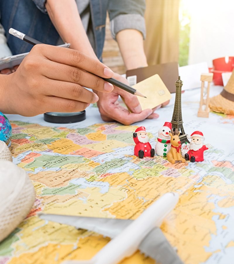 Outfit and accessories of traveler with copy space, Travel concept.Overhead view of Traveler's accessories, Essential vacation items, Travel concept on wooden background. top view.